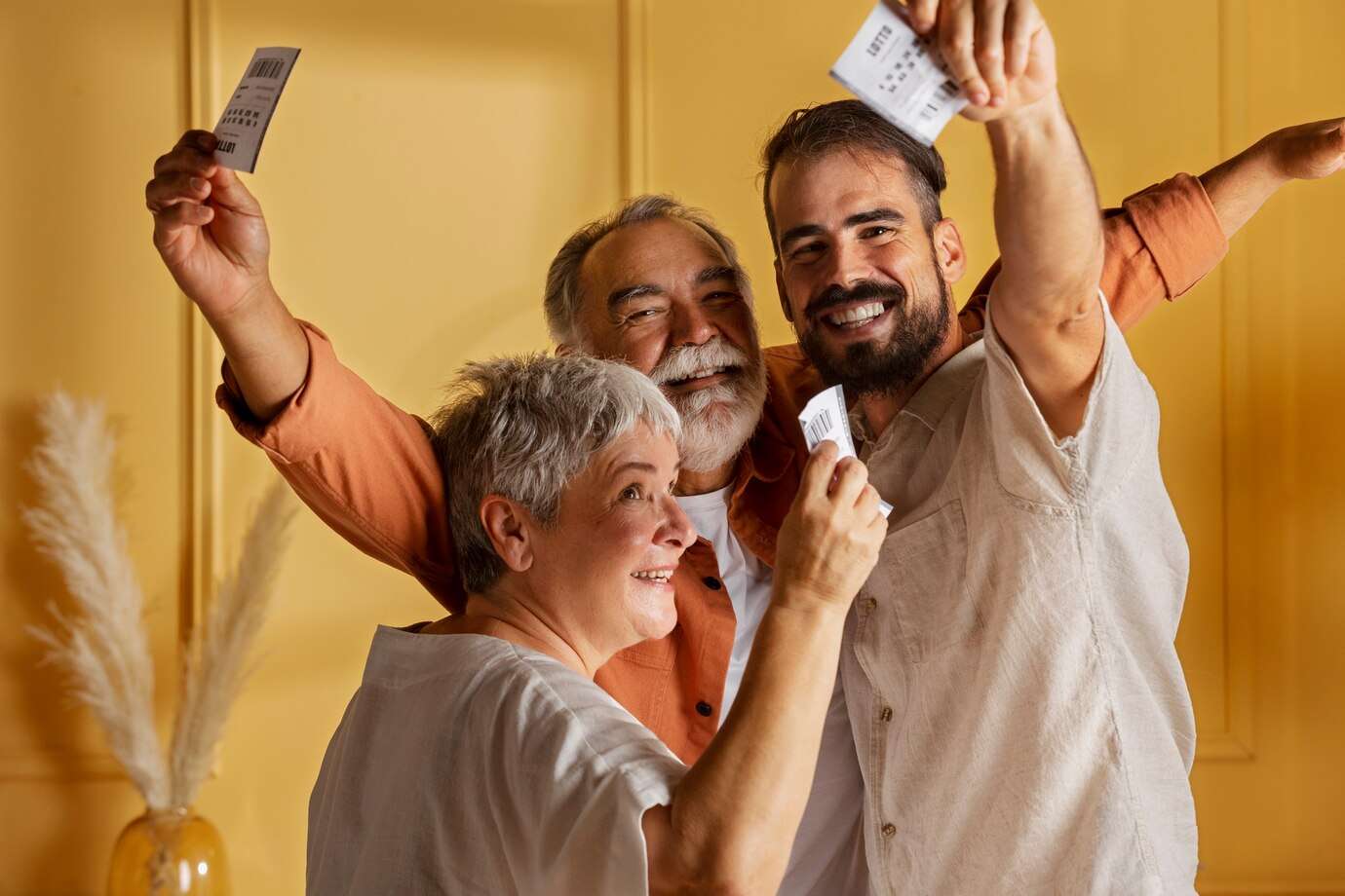 medium-shot-happy-people-with-lottery-tickets_23-2149604948